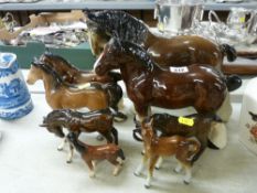 Two Royal Doulton foals and other ornamental horses