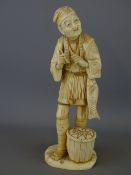 Circa 1900 carved sectional ivory Okimono depicting a smiling fisherman with pipe in his hand and