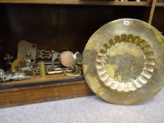 Large brass charger and a quantity of other brass items