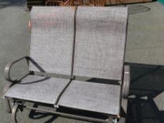 Two seater swinging garden seat