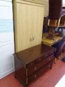 Stag Minstrel multi-drawer chest and a light wood effect two door wardrobe