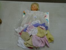 English made Tiny Tears type doll with a quantity of clothing