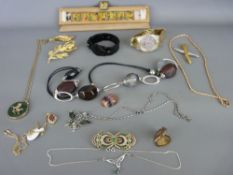 Persian type white metal bracelet and brooch with hand painted decorative panels, an Ingersoll