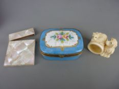 French porcelain lidded box, Victorian mother of pearl card case and a carved bone? cat and dog