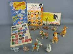 Mixed box of collectables including a Wade Jumbo Drummer with others, a part filled Vanguard stamp
