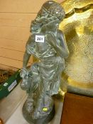 Heavy composite figure of a maiden carrying water, 67 cms high and a carved wooden figure