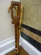 Bundle of walking sticks and a 'Big Stinger' baseball bat