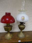 Two brass oil lamps and two good shades