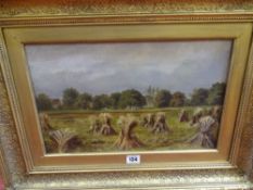 H HILTON oil on canvas - harvesting scene with figures to the background, 24 x 40 cms