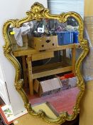 Ornate gilt framed wall mirror
