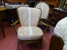 Mid Century Ercol armchair and a similar rocking chair