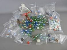 Vintage tin of collectable marbles