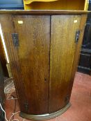Antique bow fronted wall hanging corner cupboard