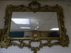 Attractive gilt framed wall mirror, mirror size 37 x 65 cms