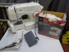 Brother XL2610 electric sewing machine and a miniature sewing machine E/T