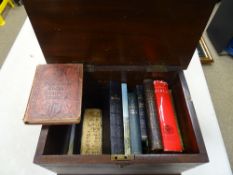 Vintage hinged wooden box with quantity of old books