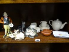 Royal Doulton kittens, Beswick kittens and a Royal Winton Pickwick figure, items of Poole pottery
