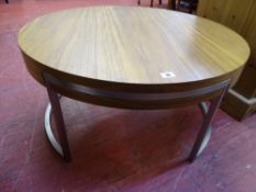 Scandinavian style circular coffee table with chrome legs