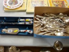 Boxed Royal Worcester serving cutlery and a parcel of flatware