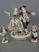 Continental porcelain group of a dandy lady and gent with a small pair of Continental figurines (