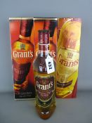 Four boxed and one unboxed bottles of Grants Family Reserve Whisky