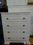 White quality modern bedroom suite comprising wardrobe, narrow chest and a four drawer chest