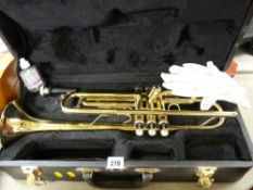 Modern brass Fanfare trumpet in a hard case