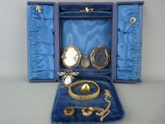 Vintage jewellery box and contents including an untested yellow metal bangle, a pinchbeck type
