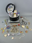 Mixed group of collectables including a quantity of badges in a modern circular jewellery box,