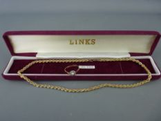 Nine carat gold rope twist necklace and an opal set with diamond chip surround nine carat gold ring