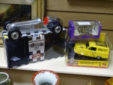 Boxed Authentic Models Indianapolis car in polished metal, a radio controlled Trotters van and a