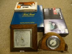 Neat Enfield polished mantel clock and a barometer with a quantity of board games etc