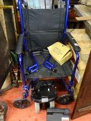 Blue wheelchair with motorized attachment etc E/T