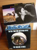 Vintage record carrying case containing a good selection of LP records - Rolling Stones, Genesis