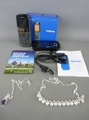 Two as new mobile phones (Burners) and a small parcel of jewellery