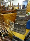 Parcel of three vintage metal fire grate fronts and a vintage metal basket on stand