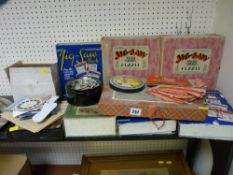 Vintage boxed jigsaw puzzles, small collection of collector's stamps, cards etc