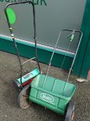 Manual power base cylinder mower and seed spreader box