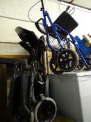 Metallic blue mobility walker and an Invacare wheelchair
