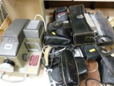 Large parcel of vintage cameras including an Aldis 303 projector, Yashica, cased Konica etc