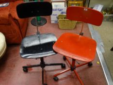 Two vintage wooden office desk chairs