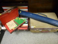 Leather cased Mah Jong set, a similar quality Backgammon set, vintage case and a snooker cue