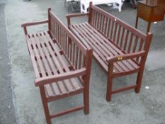 Pair of wooden slatted garden benches