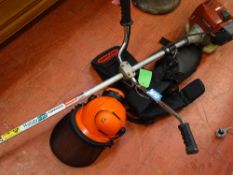 Kawasaki TJ45E strimmer with Oregon support and ear defender mask
