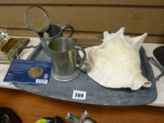 Pewter tray, two pewter tankards, conch shell etc