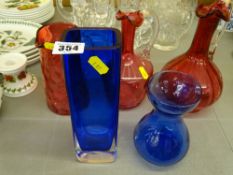 Three items of good cranberry glassware, two Bristol blue glass items, an electroplate tankard,