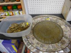 Small parcel of horse brasses and a mother of pearl decorated Aztec calendar