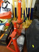 Pair of red axle stands, hand pump etc
