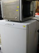 Candy upright fridge freezer and a Panasonic slimline silver finished microwave oven E/T