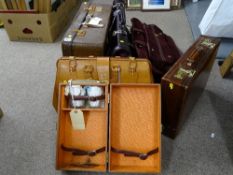 Large parcel of vintage and other suitcases including snakeskin effect, Gladstone style etc